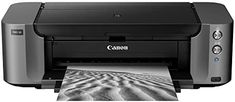 a canon printer is shown with the ink on it's print head and paper underneath