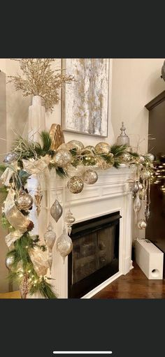 a fireplace decorated with ornaments and greenery