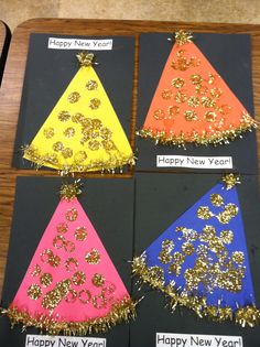 four new year's hats made out of construction paper and gold sequins