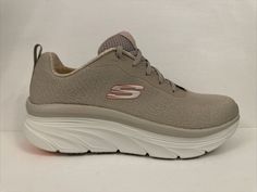 Looking for a stylish and comfortable pair of sneakers? Check out these Skechers Vegan D Lux Walkers Trainers in a mink beige colour, perfect for women who are always on the go. Created by the popular footwear brand Skechers, these trainers have a UK shoe size of 7 and feature a vegan design that is both fashionable and kind to the environment. These trainers are ideal for any casual occasion and are perfect for daily wear. The Skechers Vegan D Lux Walkers Trainers are made from high-quality materials, ensuring that they are durable and long-lasting. So why wait? Get your hands on these stylish Skechers trainers today! Sketchers Shoes, Vegan Design, Beige Colour, Walkers, Beige Color, Shoe Brands, Hands On, The Go