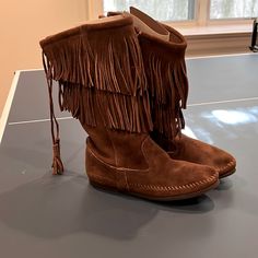 Nwot Minnetonka Women’s Size 7 Fringe Boots Inside Zipper Brand New Never Worn Excellent Condition Minnetonka Boots Outfit Winter, Casual Brown Boots With Tassels, Casual Fringe Boots With Round Toe, Minetonka Boots, Fringe Moccasin Boots, Minnetonka Boots, Minnetonka Slippers, Minnetonka Fringe Boots, Fringe Boots