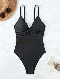 Indulge in the perfect blend of style and comfort with our Contemporary Elegance One Piece Swimsuit featuring a beautiful netting panel. This swimsuit is a modern take on classic beachwear, designed for the confident and fashion-forward individual. The contrasting mesh and twist details add a touch of sophistication, while the wireless bra and spaghetti strap neckline provide optimum support and a flattering silhouette. Crafted from a high-stretch knitted fabric, this swimsuit ensures freedom of Swimsuit One Piece, Swimwear Women, Tropical Getaways, Clean Body, Bra Types, Wireless Bra, Mesh Panel, Hermione, Bathing Suit