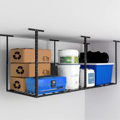 the shelves are filled with different types of containers and boxes, including one for storage