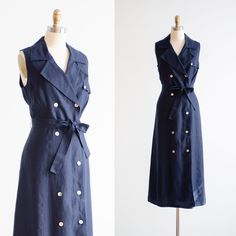 A chic, good quality dress, made from heavy navy blue Irish linen. It has a deeply notched collar, double breasted buttons, and a tie at the waist. Fully lined. ☛   m e a s u r e m e n t s   ☚ Best for: L Bust: 40 Waist: 35 Hips: 46 Length: 52 ☛   d e t a i l s   ☚ Era: 2000s Material: linen Brand: Talbot's Condition: excellent ☛   v i s i t   t h e   s h o p   ☚ https://etsy.me/2Nd23kg ☛ instagram ┇ poppycockvintage ☛ facebook ┇ poppycockvintage Navy Linen Dress, Navy Linen, 90s Dress, Quality Dresses, Irish Linen, Linen Dress, Dress Clothes For Women, Y2k Vintage, Double Breasted