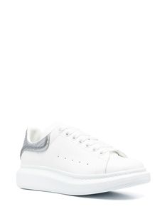 Step into a world of elegance and sophistication with these genuine leather platform low top sneakers. Made by renowned designer Alexander McQueen, they embody a fun-loving spirit with a hint of rebellious attitude while guaranteeing ultimate comfort. In a striking white and silver colorway, they're designed to steal the show without stealing your comfort. Made from 100% domesticated calf leather for a luxurious feel. A size 40.5 to ensure a perfect fit for most individuals. Featuring a stylish Silver Color Scheme, Alexander Mcqueen Men, Sneaker Games, Leather Cap, Low Top Sneakers, Casual Backpack, Lanvin, Watch Brands, White Silver