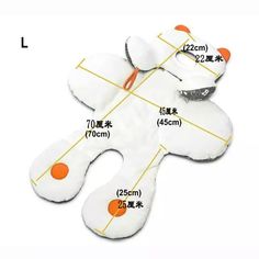 an image of a white teddy bear with orange spots on it's back and measurements