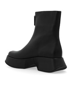 Mini Yoko black half boots, sleek and crafted from smooth calfskin, with front metal zip. This model is fitted with a rubber sole with non-slip texture, and a soft footbed, heel height 4 cmComposition: Leather, 100% Modern Leather Platform Boots With Zipper, Modern Business Boots With Zipper Closure, Modern High Ankle Platform Boots With Zipper, Modern High Ankle Platform Boots With Zipper Closure, Modern Black Calf Leather Platform Boots, Black Calf Leather Boots With Zipper Closure, Valentino Garavani Bag, Half Boots, Chloe Purses