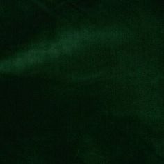 a dark green velvet textured background