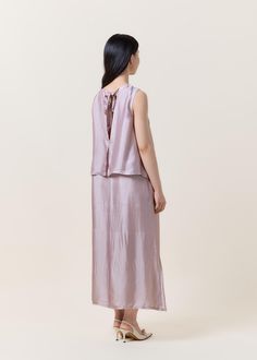 ITEM INFO Round collar dress A cut silhouette Sleeveless dress  Two layers 70% mullberry silk and 30% natural silk fiber visco The silk simple dress combines timeless style with luxurious comfort. Made from high-quality silk in Vietnam with care, this dress features a classic A-cut silhouette that flatters the figure and allows for effortless movement. The simple yet elegant design, making it suitable for a variety of occasions. Whether you're attending a formal event or simply want to add a touch of sophistication to your everyday wardrobe, this dress is the perfect choice. The comfortable fabric and beautiful cut ensure that you'll feel confident and beautiful every time you wear it. SIZING We offer 1 sizes for this dress that can fits from size S to size L Models in the photos are size Feminine Sleeveless Viscose Maxi Dress, Feminine Sleeveless Viscose Dress, Silk Sleeveless Maxi Dress In Feminine Style, Feminine Sleeveless Silk Maxi Dress, Feminine Sleeveless Silk Satin Dress, Feminine Silk Dress For Daywear, Feminine Silk Daywear Dress, Elegant Sleeveless Dress For Layering, Chic Sleeveless Rayon Slip Dress