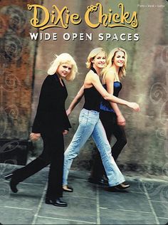 the dixie chicks'wide open spaces album cover with two women in jeans and black tops