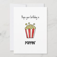 a birthday card with popcorn on it and the words, hope your birthday is poppin '