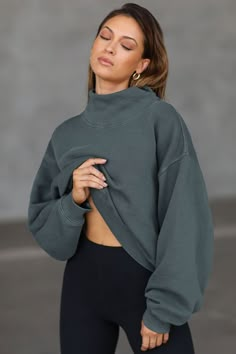 Front view of model wearing the comfortable evergreen french terry Turtleneck Sweatshirt pullover with a side split in the collar and a slightly oversized fit Brown Turtleneck, Brown Tops, Joah Brown, Turtleneck Sweatshirt, Oversized Pullover, French Terry Fabric, Side Split, Oversized Sweatshirt, Vintage Wear