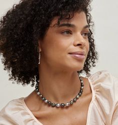 This necklace is one of the most unique combination's of multicolor pearls offered within our Tahitian pearl category. The strand includes beautiful Tahitian baroque pearls, ranging in size, color, and shape. This Tahitian pearl necklace measures in at 8mm in the back and graduates perfectly to a gorgeous 10mm centerpiece. All pieces in this black pearl necklace are AA+ quality with a high luster. Leather Pearl Jewelry, Pearl Trend, Single Pearl Necklace, Tahitian Pearl Necklace, Black Pearl Necklace, Golden South Sea Pearls, Mother Of Pearl Jewelry, Baroque Pearl Necklace, Buy Necklace