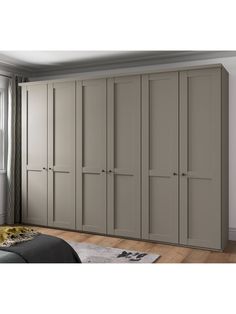 an image of a bedroom setting with large closets