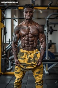 a man in camouflage sweatpants posing for a photo with his hands on his hips