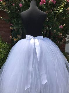 "This listing includes a White adult tutu. You can select the length range that you would desire and make a note in the note to seller section of the length you would like to go with. The white tutu pictured is a 41\" tutu. The second picture showing the silver tutu on the lady is a 34\" length tutu. Thank you for shopping with Princess Tutus Boutique. If you have any questions please feel free to convo us at anytime and we will get back with you just as soon as possible. We strive to have great White Tulle Skirt For Wedding, White Tutu Halloween Costumes For Women, White Stretch Petticoat For Party, Stretch White Petticoat With Attached Cancan, Fitted White Tutu Dress With Tulle Skirt, White Tulle Petticoat For Party, White Fitted Tutu Dress, White Wedding Skirt With Attached Cancan, White Fitted Tutu Dress With Tulle Skirt