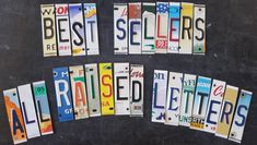 several license plates are arranged in the shape of letters that spell out best sellers on blackboard