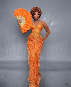 Become a showstopper in this stunning number!  Hand fan and head gear (gele) sold differently.  Please note that custom/luxury dresses cannot be returned or exchanged. All sales are final! ‼️MEASUREMENTS REQUIRED ‼️ Burst Hips  Waist Dress length  Sleeve length  Under burst Shoulder  Please note that the exact fabric might not be available and we will provide similar options  Made with 100% lace Care: Hand wash. Do not bleach Feel free to start a chat for any enquiry. Thanks for visiting. Luxury Red Sets For Traditional Ceremonies, Traditional Laos Wedding Dress, Orange Floor-length Evening Dress For Wedding, Yellow Ball Gown For Wedding, Orange Fitted Wedding Gown, Fitted Orange Wedding Gown, Fitted Orange Evening Dress For Wedding, Yoruba Wedding Dress, African Bride Dress