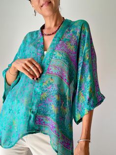 Beautiful and light silk kimono shirt  Delicate semi sheer fabric with delicate prints  Made in one free size in up cycled silk MEAESURE Free size  Shoulder 18" Bust up to 46" Length 33" MATERIAL *vintage silk  More boho style ideas at  https://www.etsy.com/shop/AltheaStores Thank you for looking Kimono Shirt, Loose Coat, Light Silk, Loose Coats, Summer Vintage, Vintage Kimono, Silk Kimono, Sheer Fabric, Vintage Summer