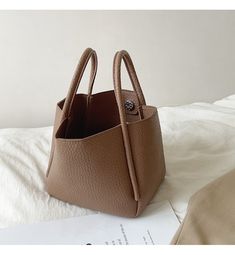 2022 Fall New style Material: High Quality Soft PU Leather Size: 12cm bottom length x 15cm tall (5in x 6in) Designer Style ID: 8376 Soft Leather Bucket Bag with Shoulder Strap and Inner Pouch Trendy Handheld Brown Pouch, Rectangular Brown Pouch For Shopping, Brown Rectangular Shopping Pouch, Rectangular Brown Shopping Pouch, Square Bucket Bag With Removable Pouch, Trendy Leather Pouch With Large Capacity, Trendy Leather Shopping Pouch, Trendy Brown Pouch For Daily Use, Rectangular Solid Color Bucket Bag With Mobile Phone Pocket