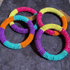 Give Any Outfit A “Pop” Of Color When You Wear One Or Two Of These Bangles. Your Choice Of Color Combinations. 2” Opening. Price Is For One. Vibrant Handmade Multicolor Beaded Bracelets, Multicolor Round Beaded Bracelets For Party, Vibrant Colorful Beaded Bracelets, Handmade Orange Beaded Bracelets For Party, Multicolor Round Beaded Bracelets With Vibrant Style, Vibrant Multicolor Beaded Bracelets, Multicolor Tiny Beads Bracelets For Party, Colorful Round Beaded Bracelets For Party, Multicolor Faceted Beaded Bangle Bracelet