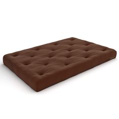 an image of a brown futon mattress on white background with clipping for text