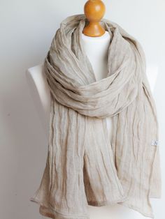 Natural BALTIC LINEN scarf handmade by Zojanka. * Light and soft linen scarf,this oversized shawl is made of very light pure linen fabric * Shawl/wrap is made of 100% baltic linen fabric, which is produced in Poland. * Scarf drapes very well, can be worn in many many ways. Shawl can be worn with your favourite t-shirt and pair of jeans with other linen, it will add some stylish look to your outfit. * I have secured edges with a small hem, it won't fray * Shawl is naturaly creased * Ready for shi Beige Linen Bohemian Scarf, Bohemian Beige Linen Scarf, Linen Scarf, Scarf Handmade, Linen Scarves, Scarf Fashion, Grey Scarf, Shawl Wrap, Cotton Scarf