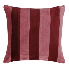 a red and purple striped pillow on a white background