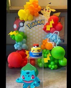 a pokemon themed birthday party with balloons and decorations