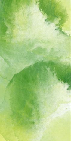 an abstract green and yellow background with watercolor stains on the bottom half of it