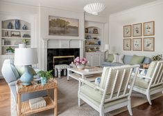 a living room filled with furniture and a fire place