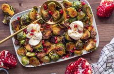 roasted brussel sprouts with pomegranate and eggs on a platter