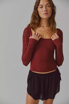 So Many Likes Long Sleeve | Free People Fitted Long Sleeve Tops With Elastic Sleeves, Stretch Scoop Neck Long Sleeve Top For Winter, Winter Stretch Long Sleeve Top With Scoop Neck, Seamless Long Sleeve Top For Fall, Winter Stretchy Long Sleeve Scoop Neck Top, Fall Tops With Elastic Sleeves And Square Neck, Fitted Pointelle Knit Long Sleeve Tops, Red Long Sleeve Hippie Top, Vintage Long Sleeve Open Knit Tops