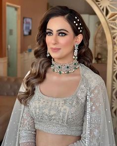 20+ Pearl-Adorned Bridal Hairstyles That You'll Love Engagement Hairstyles Open Hair, Sangeet Hairstyles For Bride Long Hair, Hairstyles For Ring Ceremony, Sangeet Hairstyles For Bride Open Hair, Open Hair Hairstyles Wedding Indian, Roka Hairstyles, Hair Styles On Lehenga, Reception Hairstyles Indian Brides Lehenga, Front Variation Hairstyle Indian