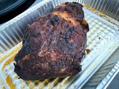 a piece of meat sitting on top of a pan