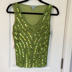 Beautiful Chartreuse Mesh Top With A Really Pretty Neckline, Covered With Beads And Sequins. New With Tag And In Pristine Condition. Top Is Extremely Stretchy. Approximate Measurements Laying Flat Are As Follows: Armpit To Armpit - 17”; Waist - 15”; Hips - 17”; Length - 22”. Top Will Easily Stretch 3 To 4 Inches Additionally. Stretch Embellished Party Blouse, Stretch Beaded Top For Party, Embellished Stretch Blouse For Party, Green Sequined Party Blouse, Glamorous Green Tops For Evening, Glamorous Green Top For Evening, Glamorous Green Evening Tops, Green Fitted Glamorous Top, Embellished V-neck Top For Party