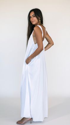 Forever free and flowy, this effortless maxi dress from Khush Clothing features a v neck and wide straps and is designed for effortless beachside days and evenings. ** Our Model is wearing a size XS. She is 5'6", and has 32 A bust, 26" waist , and 33" hips. Fabric and Care Instructions: *100% Rayon *Hand wash cold * Line Dry Retail Boutique, Casual Jewelry, Signature Jewelry, Underworld, Wide Straps, Fashion Inspiration, Care Instructions, Fashion Dresses, Hand Wash