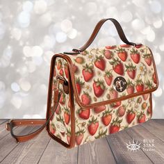 "Bring a touch of style into your every day with our gorgeous Tan Strawberries Handbag!  This stunning cross-body bag features a beautiful strawberries design and is perfect for all of your daily essentials. Crafted from top-quality materials, this handbag is both practical and stylish. With its spacious interior and comfortable shoulder strap, it's the perfect accessory for any occasion. Whether you're heading out to work or running errands, this Sunflower Purse is sure to turn heads. So why wait? Treat yourself or a loved one to this stunning Tan Strawberries Women's Accessory today and add a little sunshine to your life! ♥ See our other strawberry items here: https://www.etsy.com/shop/BlueStarTrader?search_query=strawberries ► ABOUT THIS PURSE Main Design Colors: Tan, Red Trim Color: Br Trendy Cheap Bags With Strawberry Print, Trendy Rectangular Bag With Strawberry Print, Cute Red Shoulder Bag With Adjustable Strap, Red Bag With Strawberry Print As Gift, Rectangular Bag With Strawberry Print As Gift, Rectangular Bags With Strawberry Print For Gifts, Rectangular Bags With Strawberry Print As Gift, Rectangular Strawberry Print Bag As A Gift, Rectangular Strawberry Print Bag For Gifts