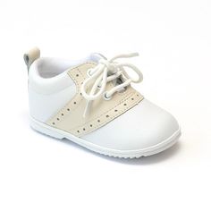 This two tone white/beige leather saddle oxford is designed for your active little one. Great shoe for dressing up with no fuss. Perfect for little gents or little ladies. Leather upper Lace up front with perforated trim Rubber outsole Pull tab at collar Note: Sizes 1-7 (Baby 1 to Toddler 7) Size Chart (in-sole length, measured from inside): Size 1 2 3 4 5 6 7 Inches 4.25 4.56 4.86 5.25 5.44 5.81 6.13 Angel Baby Shoes, White Oxford Shoes, Best Baby Shoes, Saddle Oxfords, Boys Fashion Trends, Shoes For School, Baby Boy Dress, Narrow Shoes, Saddle Shoes