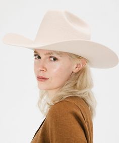 From coffee dates to country music festivals, the Teddy Cattleman Hat has you covered. With a true cattleman crown + wide western brim, this classic cowgirl hat is sure to stand out in a crowd. May we suggest taking Teddy up a notch? Shop Western bands + your favorite hat trims to make the look your own! Bands pictured are sold separately HERE!