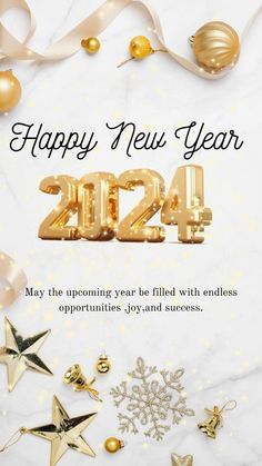 a happy new year card with gold stars and decorations on a white marble tablecloth