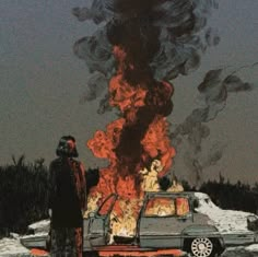 a man standing next to a car in front of a fire