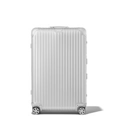 Crafted from high-end anodized aluminum, RIMOWA Original is an iconic luggage design, instantly recognizable with its sleek lines and signature grooves. Within a vast range of sizes, find your trusted and durable companion for your business and leisure travels. Ideal for 14 to 15 days of travel, the RIMOWA Original Check-In L in silver features several ingenious functionalities: - Stage-free telescopic handle - RIMOWA Multiwheel® System - TSA-approved locks - Flex Divider Includes a complimentar