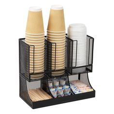 two trays with cups and plates stacked on top of each other in a holder