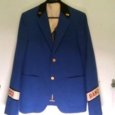 Bnwt 100% Authentic Mens Gucci Band Blazer. Royal Blue With Silk Pink Rose Lining. Gold Button Closure And Gold Us Pins On Black Collar. "Gucci" Across Right Wrist"Band" Across Left. Size 50 Tailored Gucci Blazer With Buttons, Gucci Winter Blazer, Winter Gucci Blazer With Buttons, Gucci Winter Blazer With Buttons, Gucci Blazer With Buttons For Fall, Gucci Workwear Blazer With Buttons, Gucci Blazer With Buttons For Work, Classic Gucci Blazer With Buttons, Blue Gucci Outerwear For Work