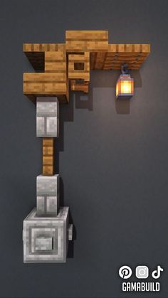 a lamp hanging from the side of a wall next to a brick structure with a lantern on it