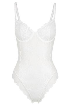 The Elodie bodysuit is truly show-stopping and a lace lover's dream. With soft-to-touch lined white mesh and lace body detailing, this bodysuit has goddess written all over it. Wear it in or out, you decide. Perfect for an exposed lingerie look Lace lined cups Adjustable straps Strap detail Open close press stud gusset Carefully crafted with soft stretch mesh Cold hand wash only, dry flat in shade. Poly/Elastane 100% Cotton gusset Our model Nikki is a 32C & size 4 and wears a size small. She Lacey Lingerie, White Lace Bodysuit, Silk Bodysuit, White Lace Lingerie, Small Bra, Body Suit Outfits, Lace Body, Lace Set, Bodysuit Lingerie