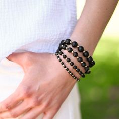 A little neutral color for your everyday stack! Made with (8mm or 10mm) black onyx gemstones and 14k gold filled beads. Easy wear and effortless bracelet stacking with stretch cord design. Bracelets are made to fit average size (7 inch wrist). Please contact us if you have any sizing questions or would like a custom size. Adjustable Onyx Stretch Bracelet With Black Beads, Elegant Black Stackable Beaded Bracelets, Black Onyx 8mm Beads Stretch Bracelet, Luxury Black Onyx Beaded Bracelets, Elegant Hand-strung Onyx Beaded Bracelets, Bracelets Easy, Silver Link Chain, Sterling Silver Bead Bracelet, Bracelet Stacking