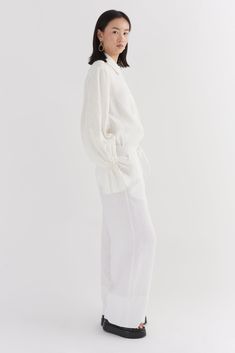 A trouser made of 100% linen. The wide leg floaty trousers features an elasticated waist with a drawstring detail, side entry pockets and a cuff design detail at the trouser hem. White Linen Trousers, Cuff Design, Drawstring Detail, Silk Trousers, Ivory Silk, Linen Trousers, Silk Shirt, Silk Scarves, White Linen