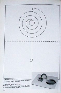 an instruction manual showing how to use scissors for cutting paper with holes in the middle